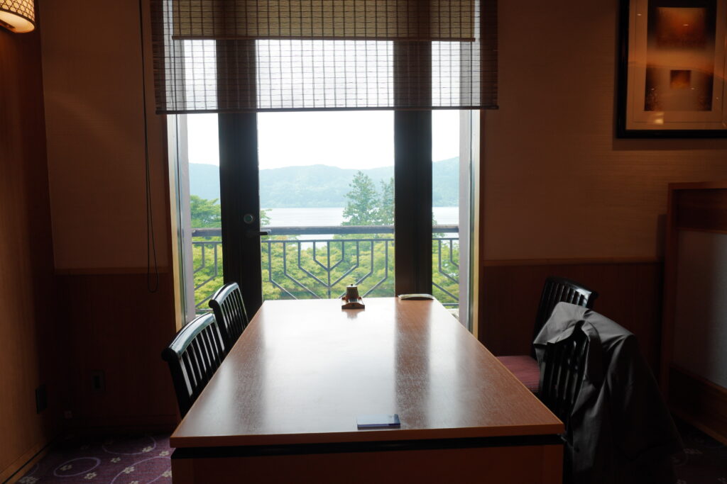Window seat at Hotel de Yama restaurant overlooking Lake Ashi