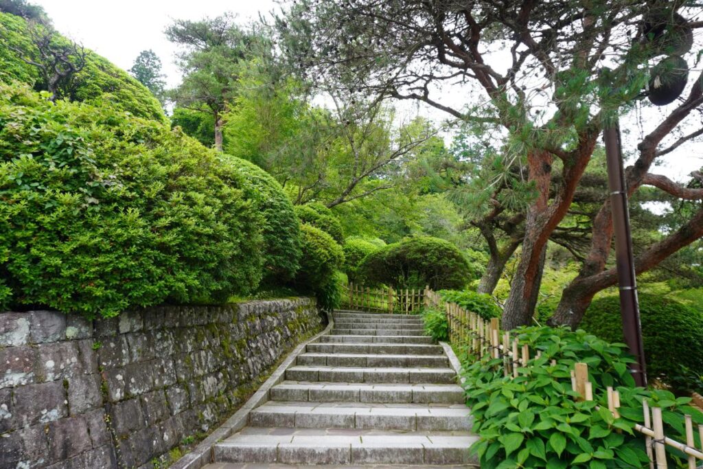 Stone steps leading through the gardens of Onshi Hakone Park