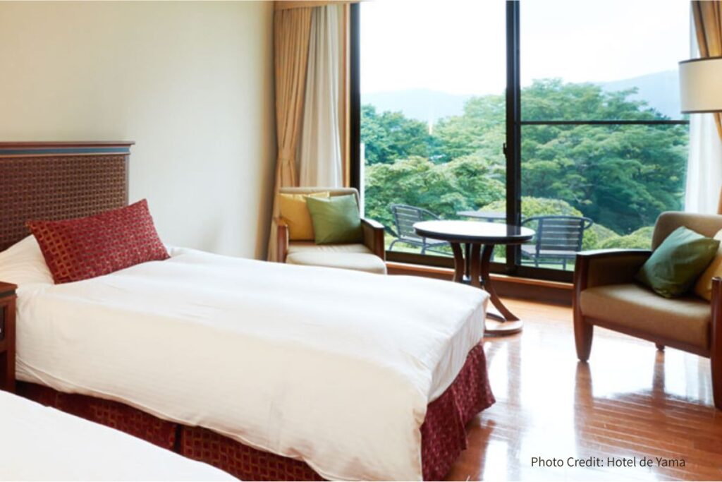 Twin room with garden view at Hotel de Yama