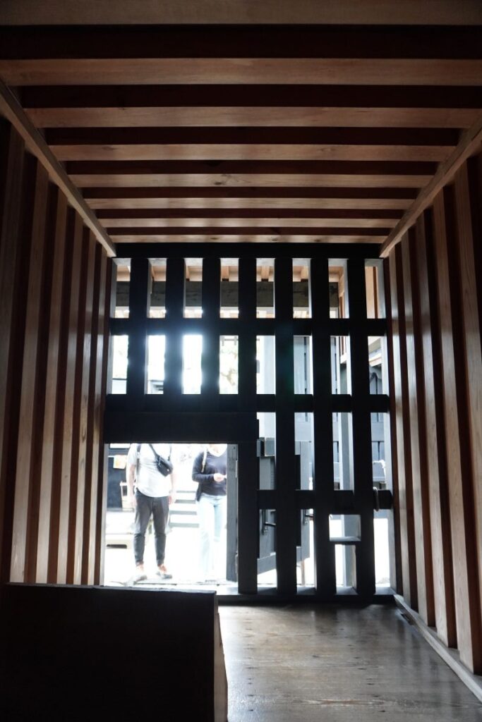 Heavy wooden security gate inside the reconstructed Hakone Checkpoint.