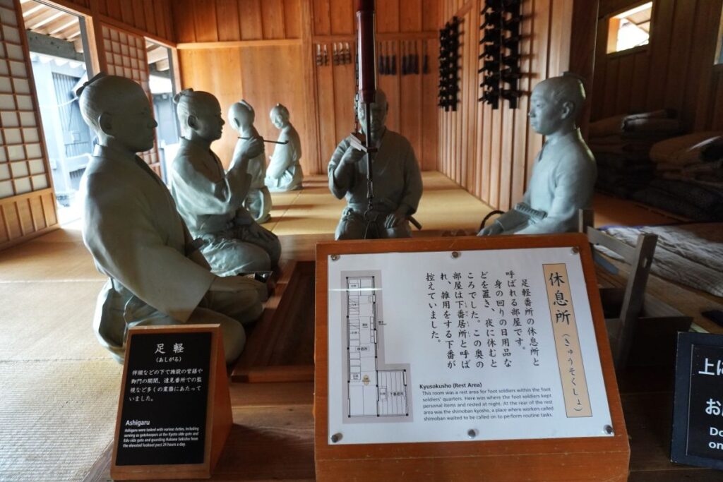 Foot soldiers resting inside the reconstructed guard room at Hakone Checkpoint.