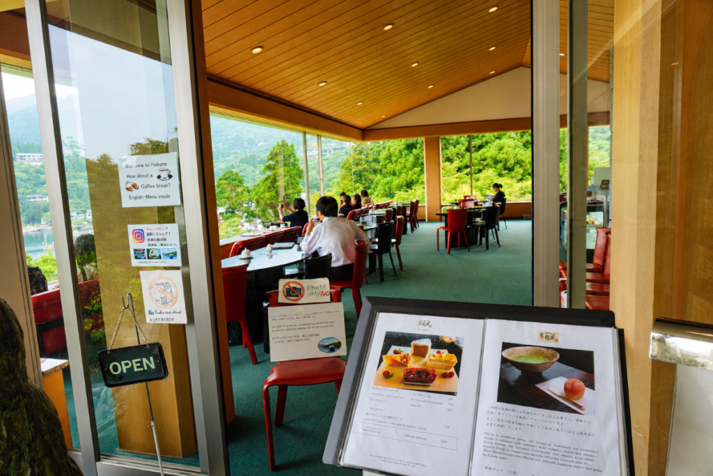 Tea lounge inside Narukawa Art Museum overlooking Lake Ashi