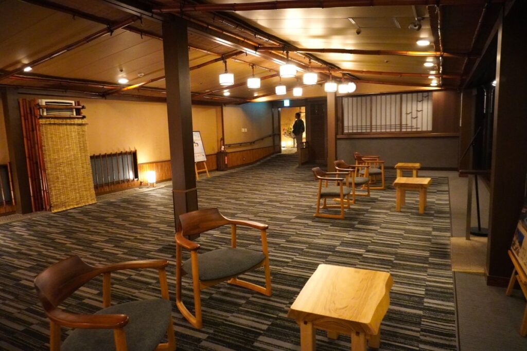 Spacious relaxation lounge near the hot spring baths at Hotel Okada