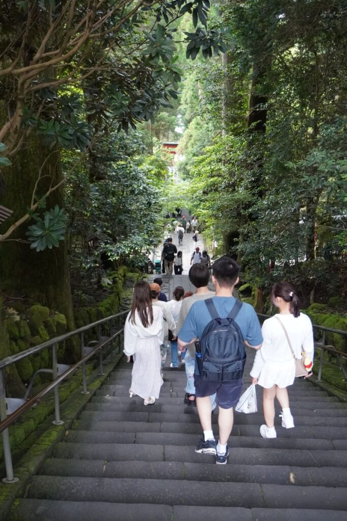 Stone steps descending from Hakone Shrine toward Lake Ashi