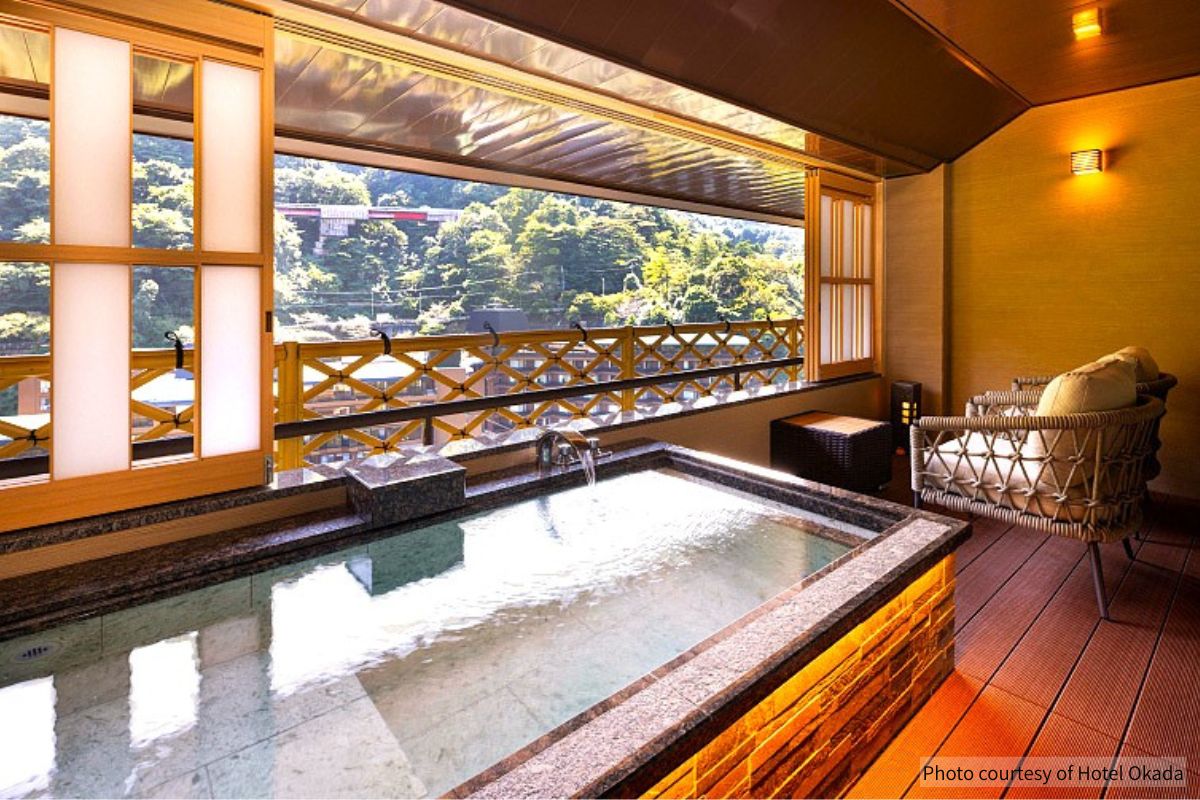 Private open-air hot spring bath with mountain views at Hotel Okada (Photo courtesy of Hotel Okada)