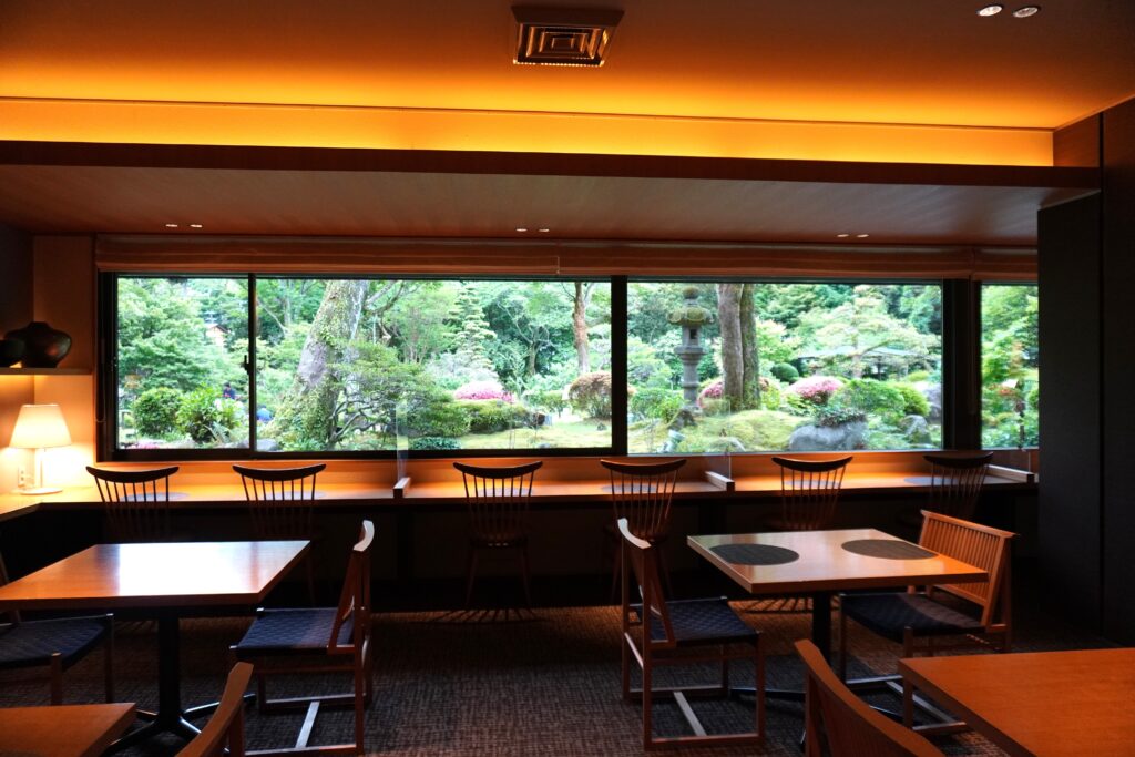 Café overlooking the Japanese garden at Yoshiike Ryokan