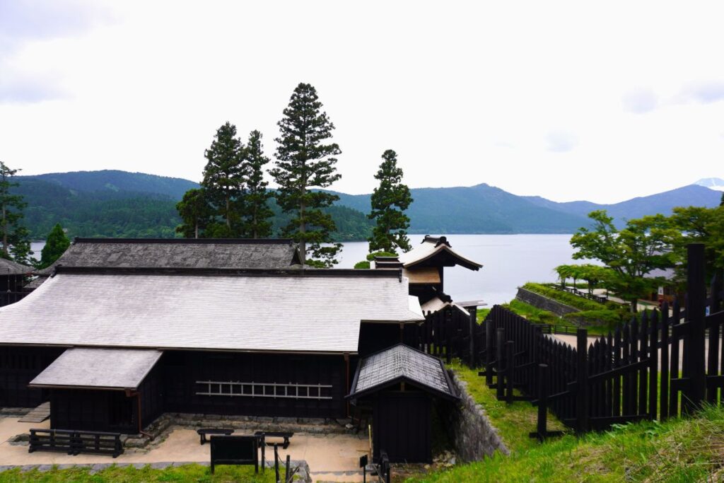 View of the reconstructed Hakone Checkpoint with Lake Ashi in the background.