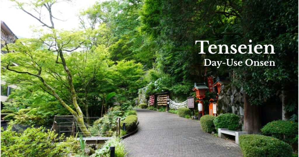 Tamadare Shrine path at Tenseien in Hakone-Yumoto surrounded by lush greenery.