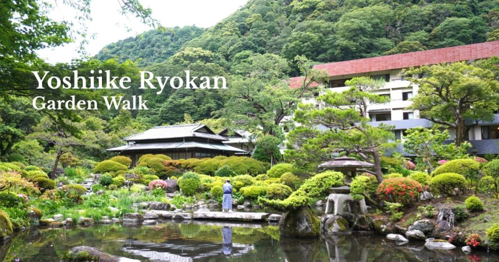 Traditional Japanese garden walking path at Yoshiike Ryokan in Hakone-Yumoto, Japan.