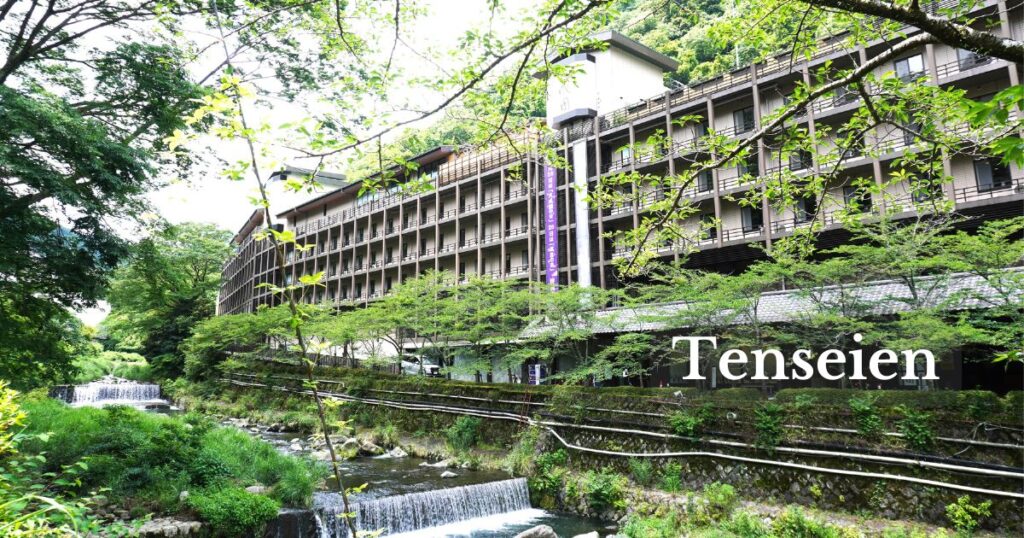Exterior view of Tenseien ryokan in Hakone-Yumoto beside a mountain stream.