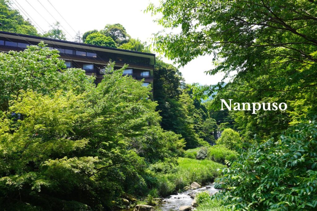 Nanpuso surrounded by lush greenery along the Sukumo River