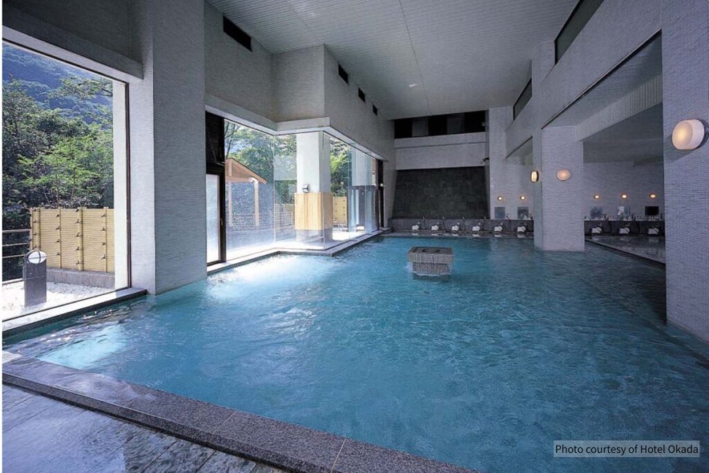 Open-air hot spring bath surrounded by nature at Hotel Okada in Hakone (Photo courtesy of Hotel Okada)