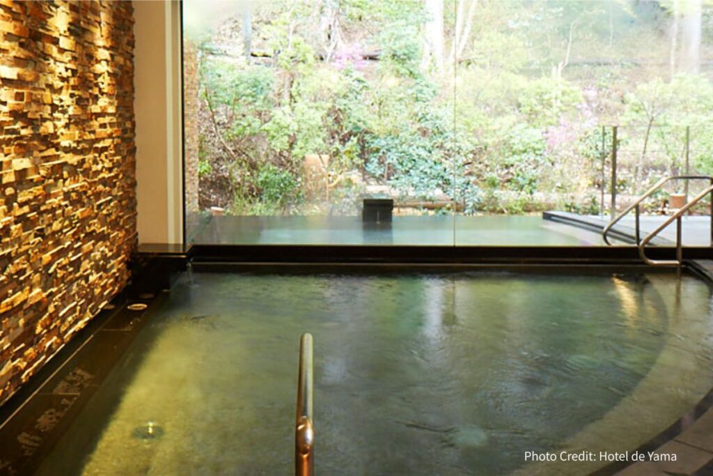 Indoor natural hot spring bath at Hotel de Yama
