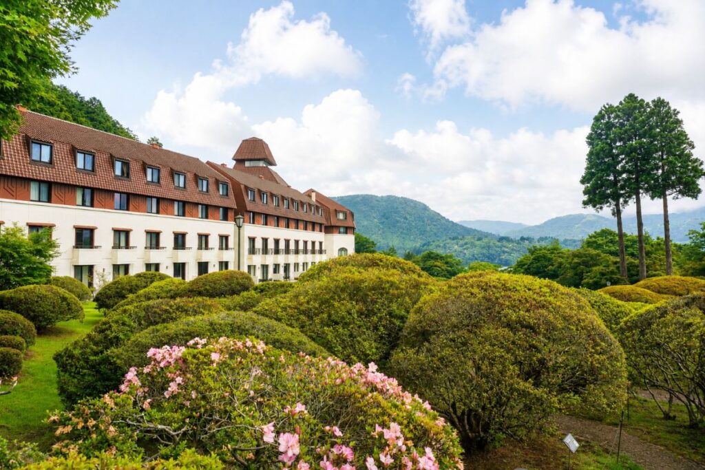 Hotel de Yama surrounded by gardens with Lake Ashi and Hakone mountains in the backgroun