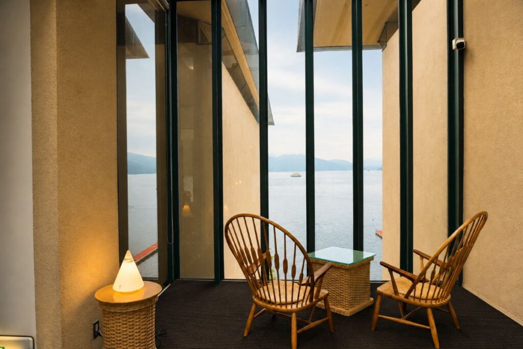 Guest lounge with large windows at Hakone Hotel